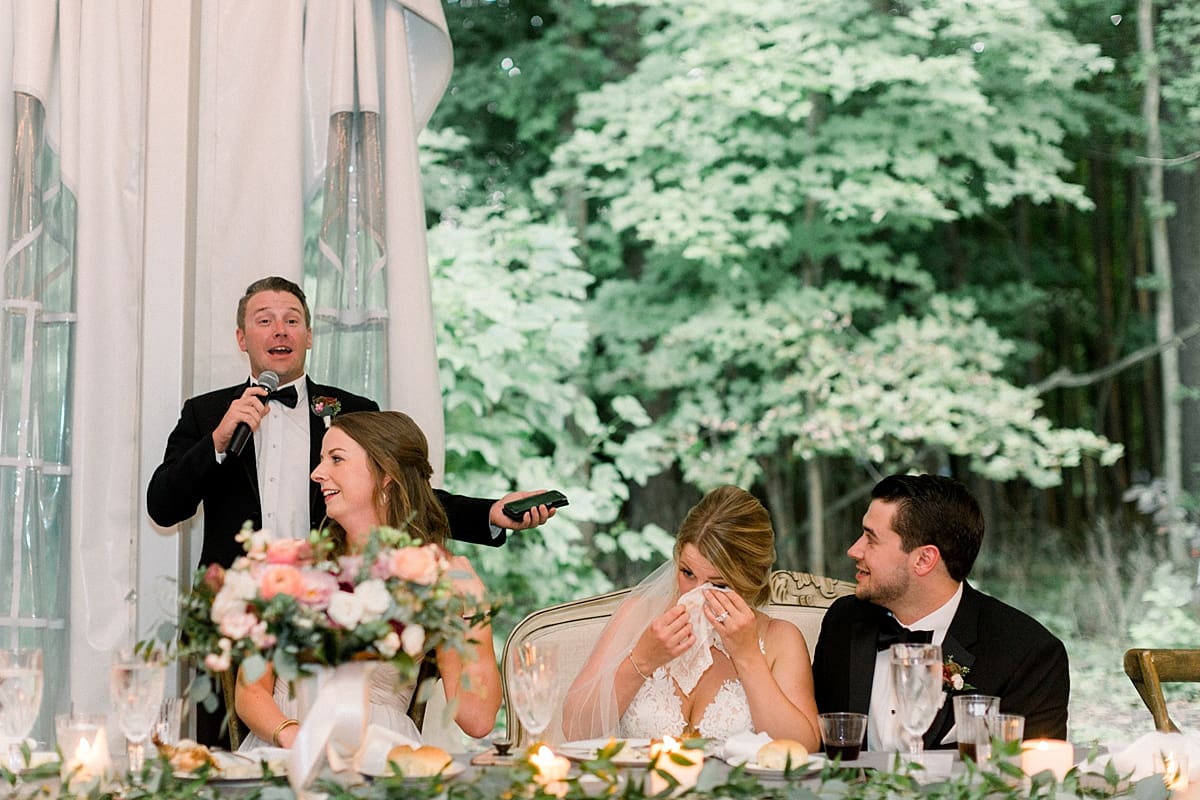 Arielle Peters Photography | Bride and groom crying during speeches at wedding reception at The Morris Estate in Niles, Michigan on wedding day.  
