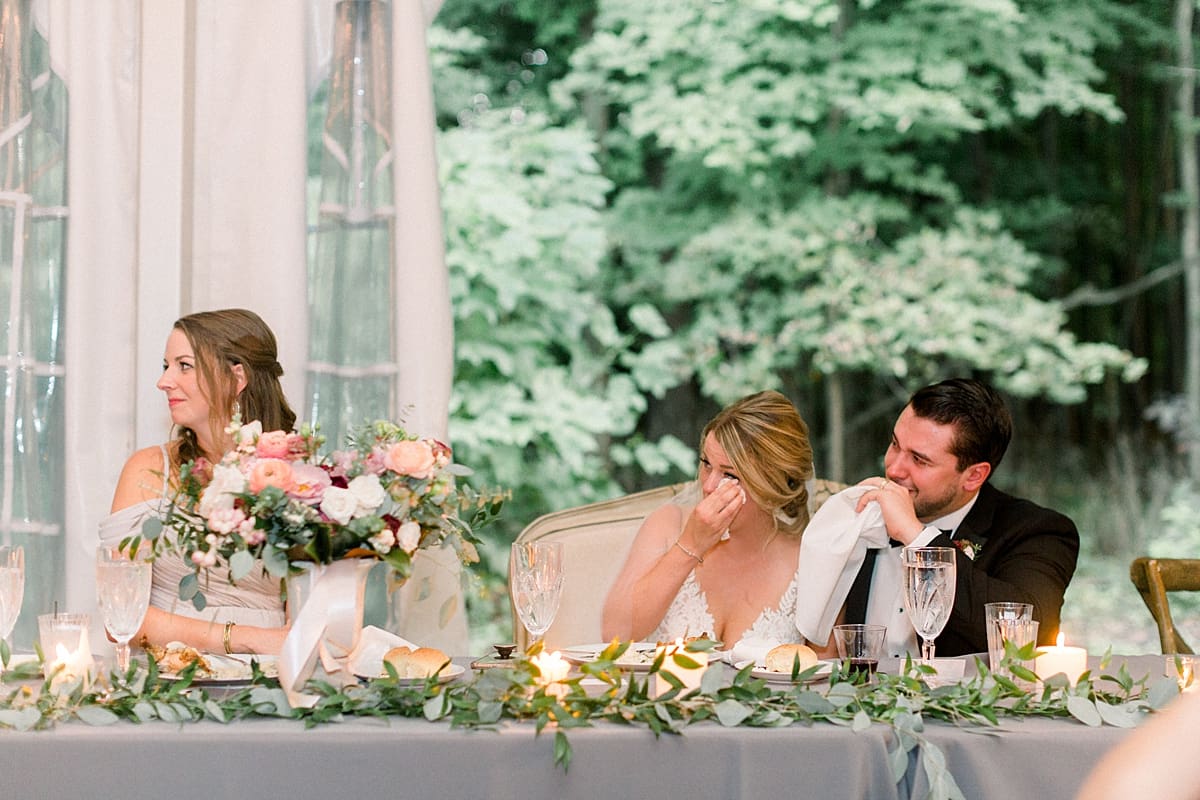 Arielle Peters Photography | Bride and groom crying during speeches at wedding reception at The Morris Estate in Niles, Michigan on wedding day.  