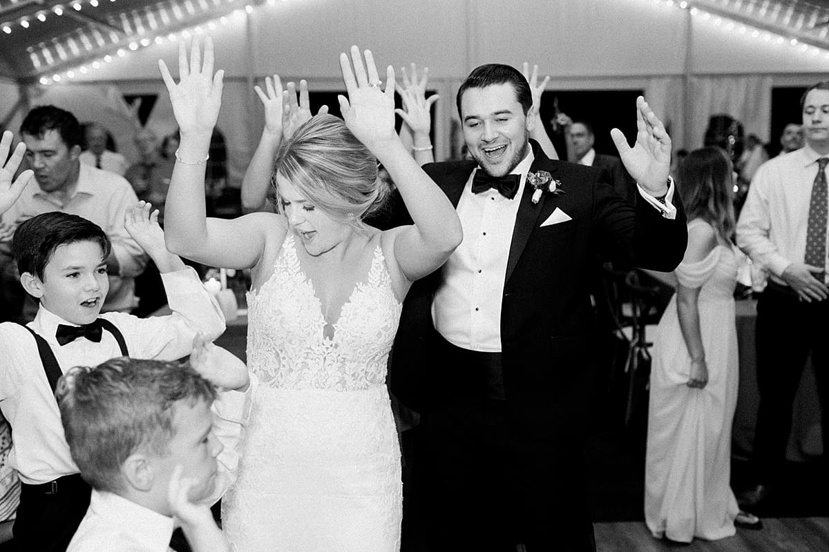 Arielle Peters Photography | Bride and groom dancing with wedding guests at wedding reception at The Morris Estate in Niles, Michigan on wedding day.  