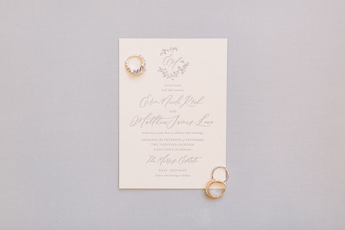 Arielle Peters Photography | Wedding rings and invitations at The Morris Estate in Niles, Michigan on wedding day. 