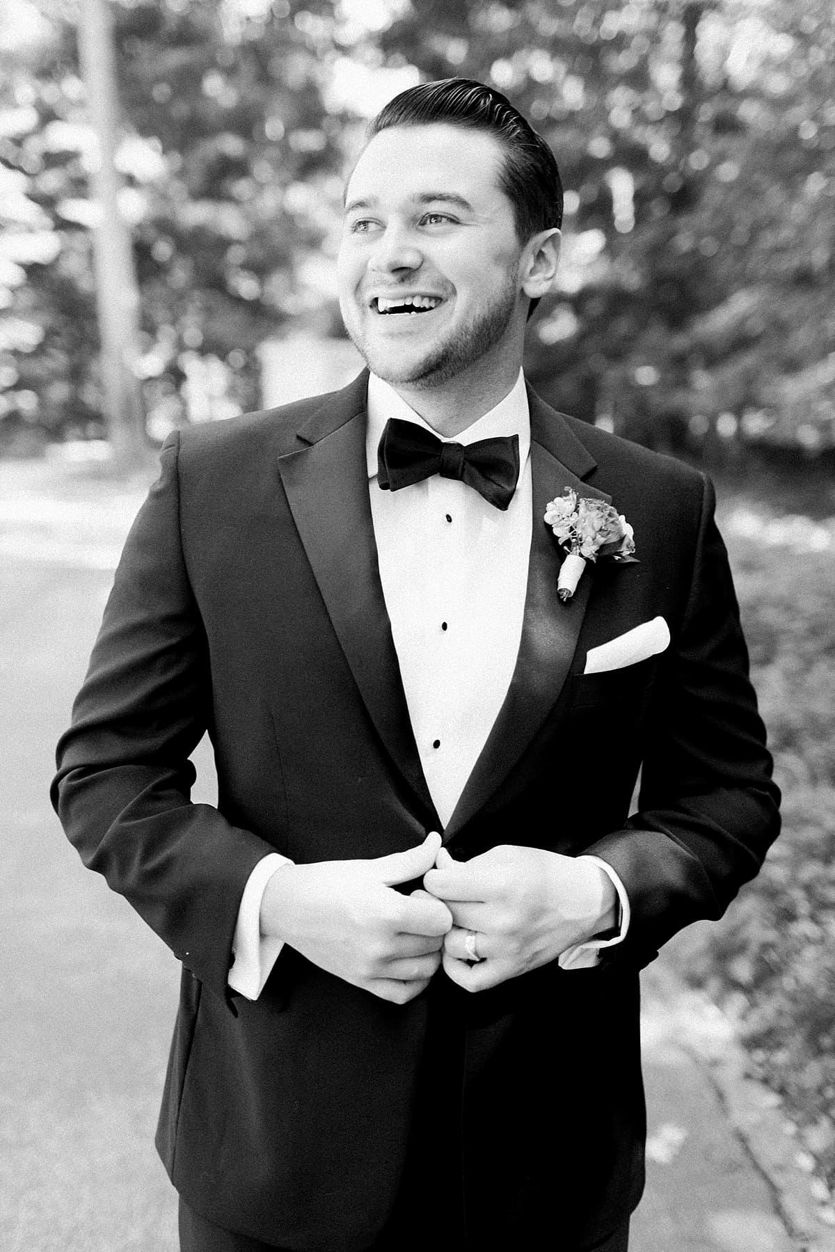 Arielle Peters Photography | Groom smiling in his tux on wedding day at The Morris Estate in Niles, Michigan on wedding day. 