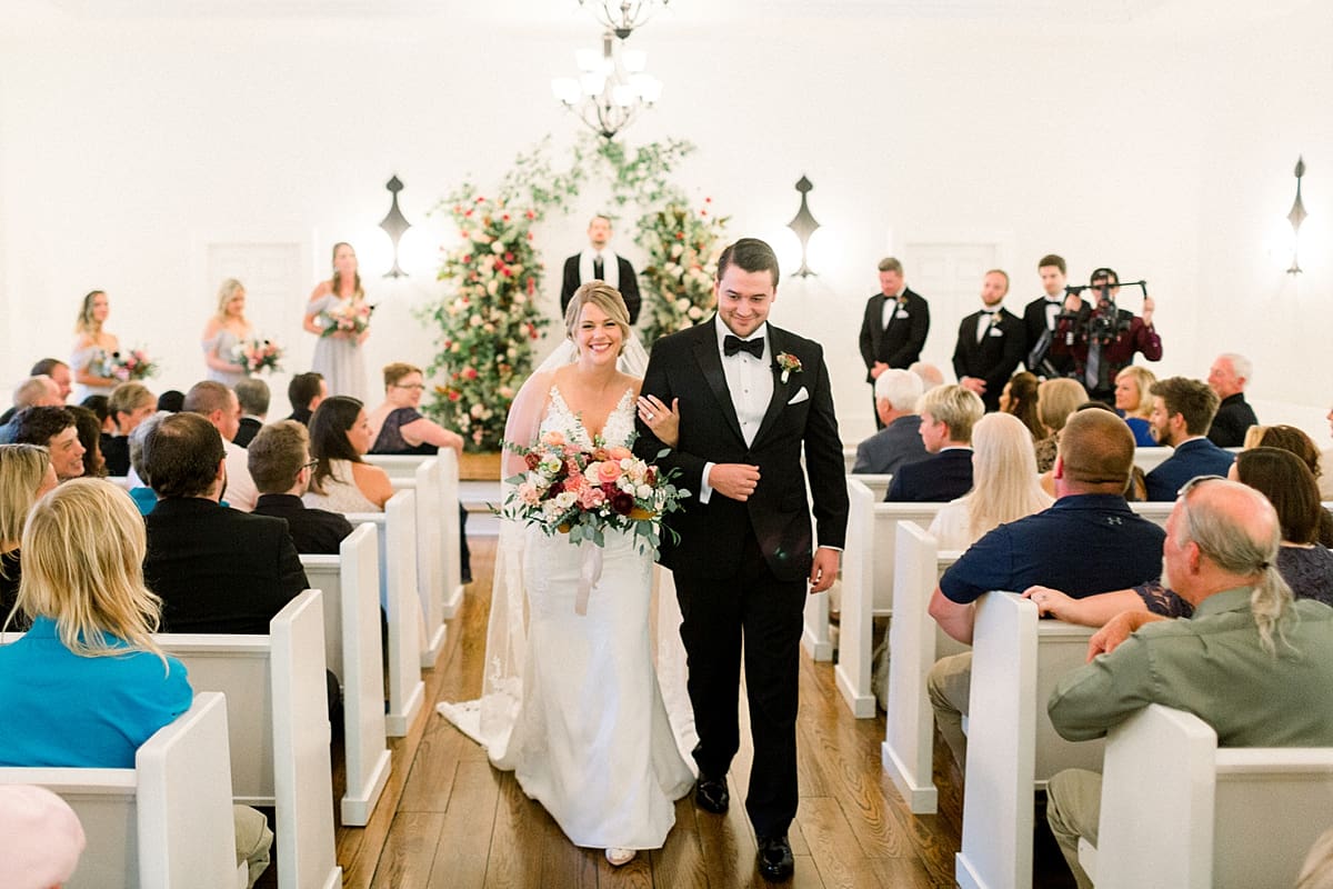 Arielle Peters Photography | Bride and groom walking down the aisle at The Morris Estate in Niles, Michigan on wedding day. 