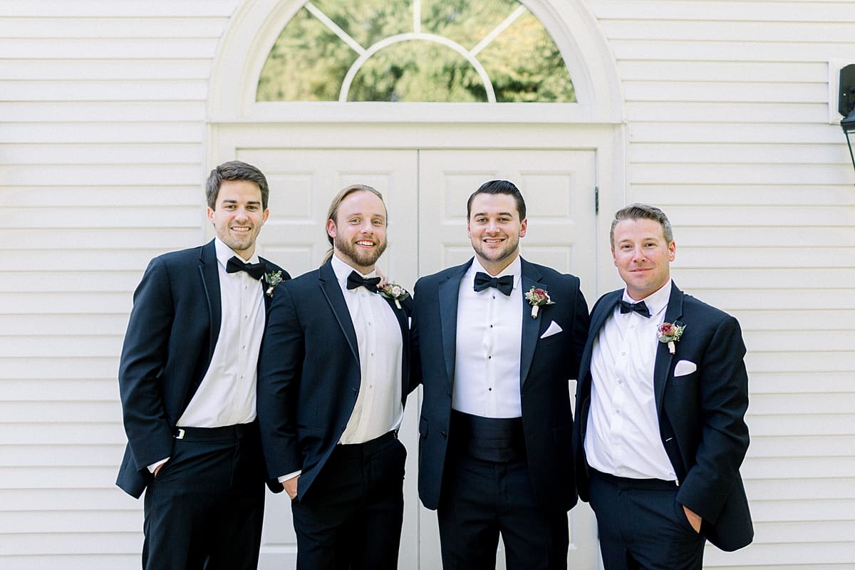 Arielle Peters Photography | Groom and groomsmen outside the church at The Morris Estate in Niles, Michigan on wedding day. 