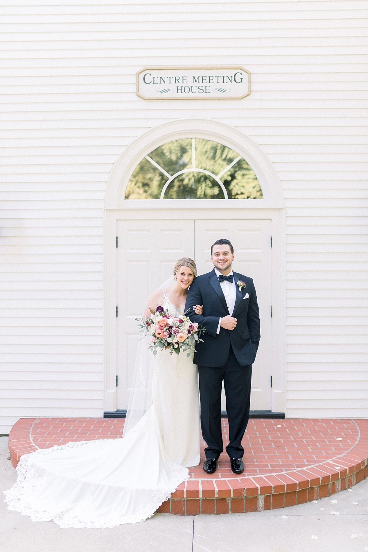 Arielle Peters Photography | Bride and groom smiling and linking arms at The Morris Estate in Niles, Michigan on wedding day. 