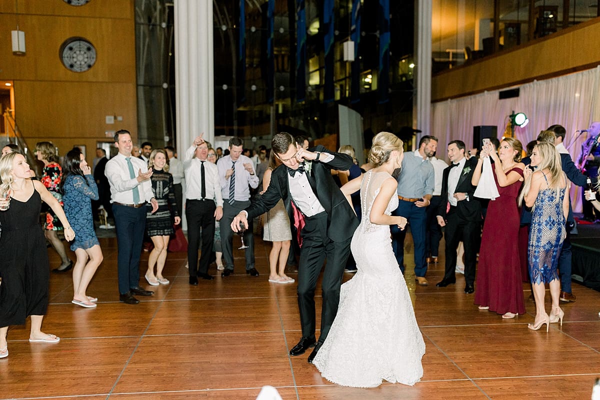 Arielle Peters Photography | Bride and groom and wedding guests dancing and having fun at wedding reception in Indy Public Library in Indianapolis.