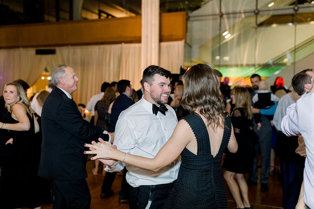 Arielle Peters Photography | Wedding guests dancing and having fun at wedding reception in Indy Public Library in Indianapolis.