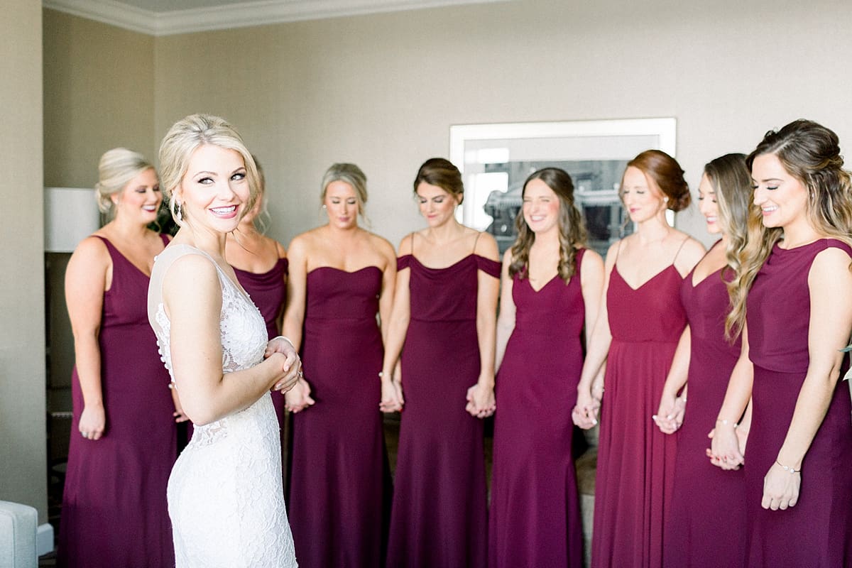 Arielle Peters Photography | Bridesmaids seeing bride in her dress on wedding day in Indianapolis.
