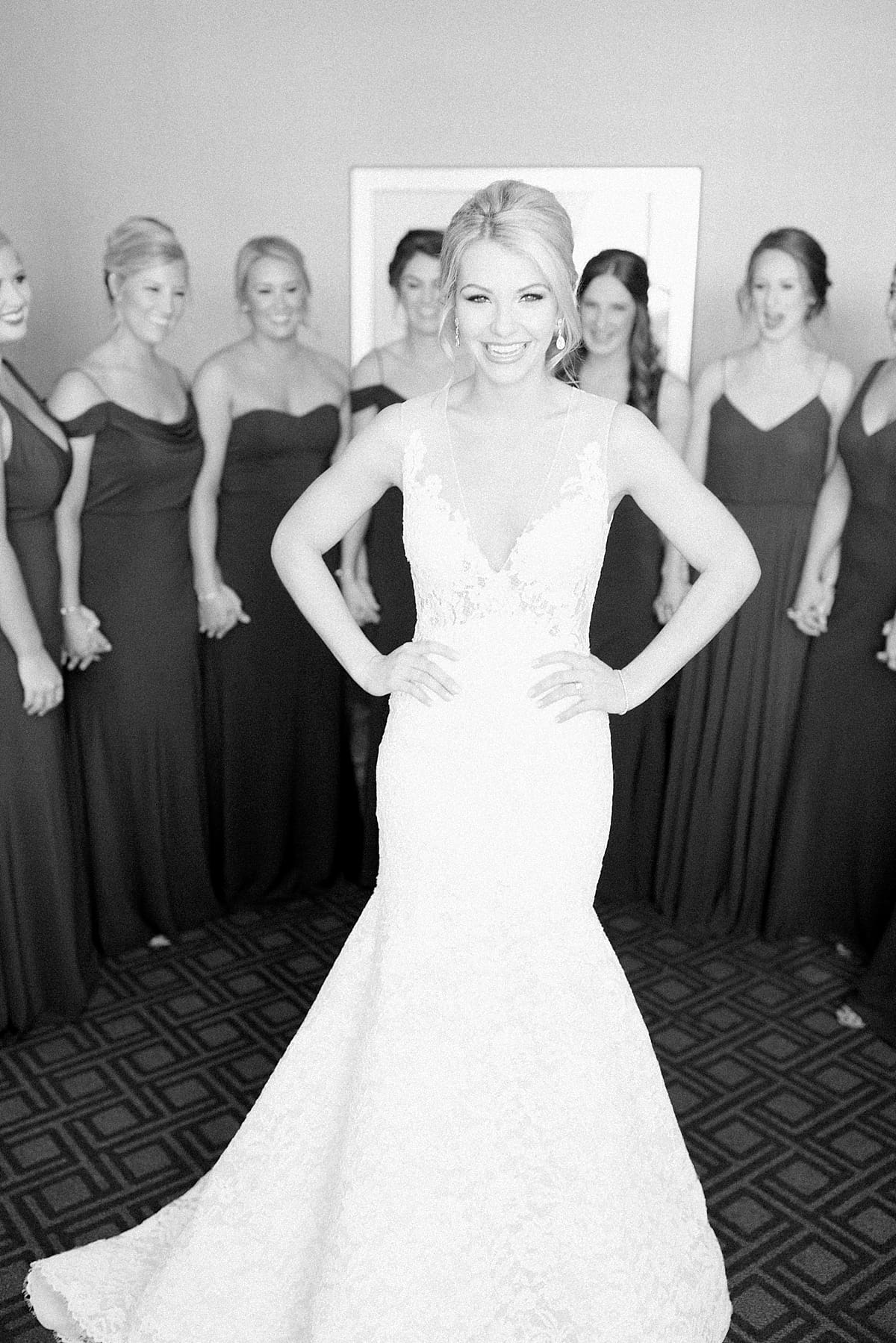 Arielle Peters Photography | Bridesmaids seeing bride in her dress on wedding day in Indianapolis.