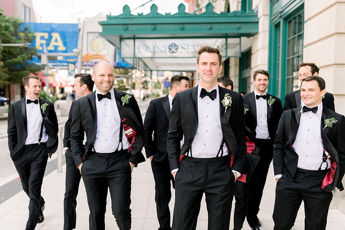 Arielle Peters Photography | Groom and groomsmen walking downtown Indianapolis on wedding day.