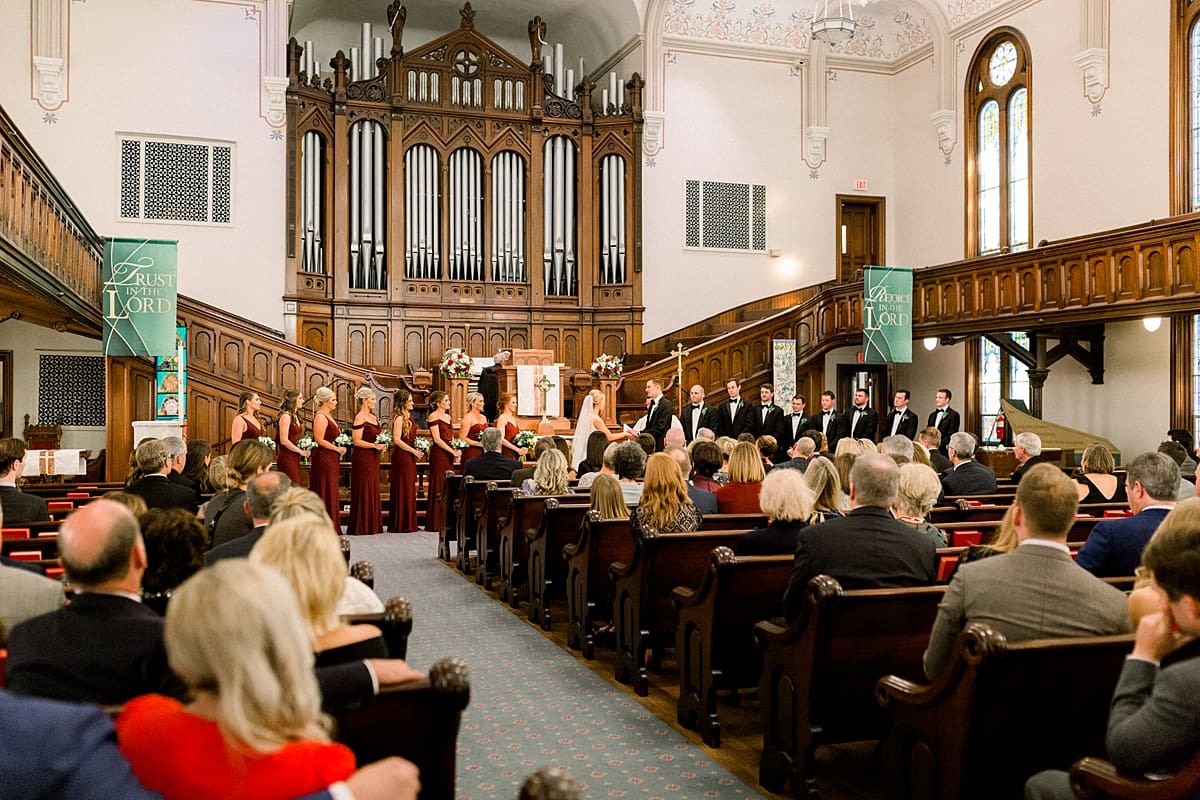 Arielle Peters Photography | Bride and groom at the alter in Roberts Park Church in Indianapolis on wedding day.