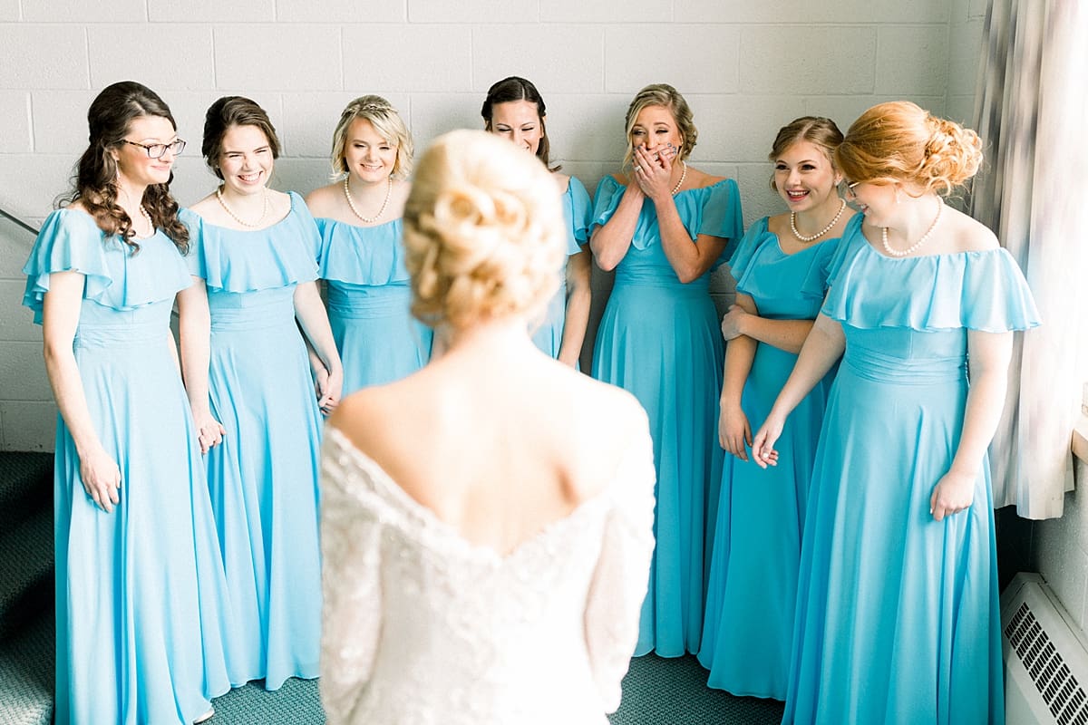 Arielle Peters Photography | Bridesmaids seeing the bride in her dress for the first time on fall wedding day.