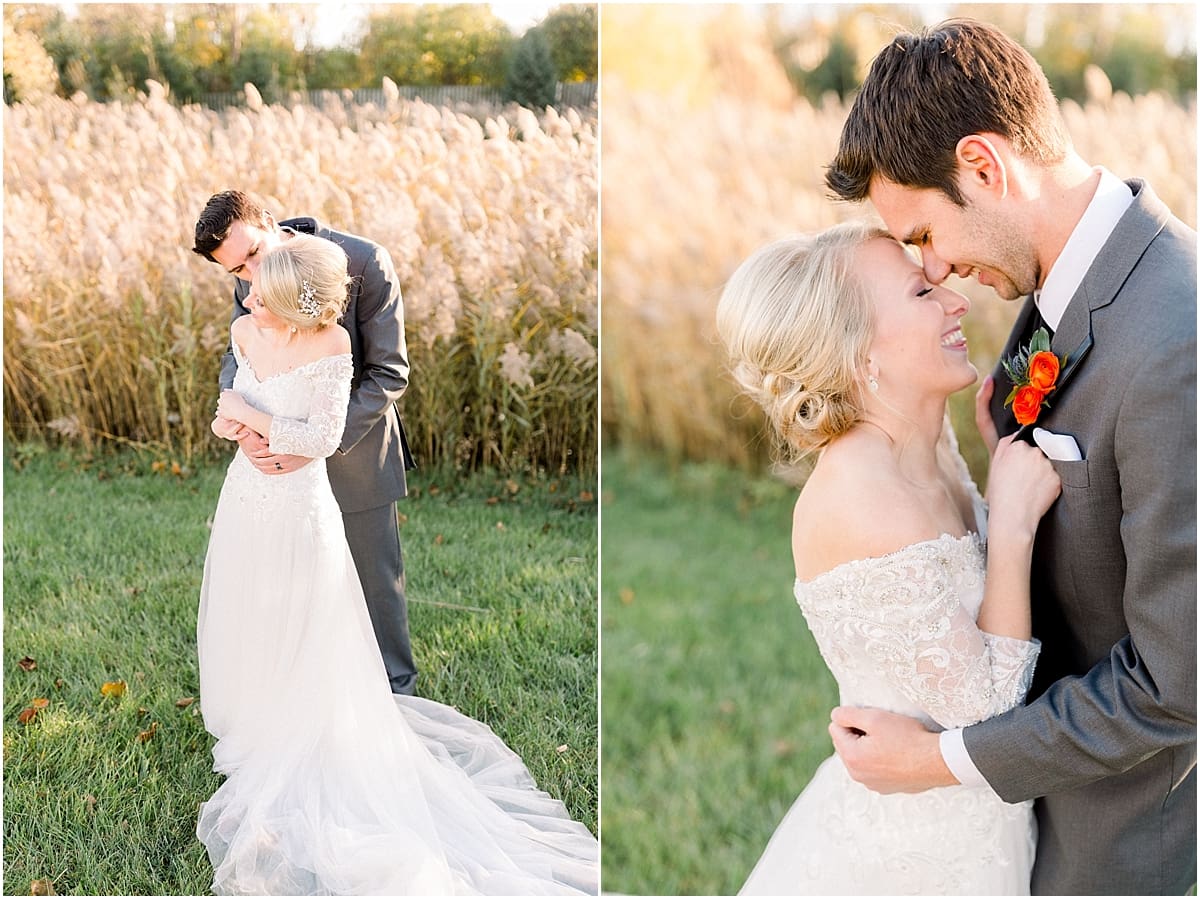 Arielle Peters Photography | Groom holding the bride in his arms outside in field on fall wedding day.