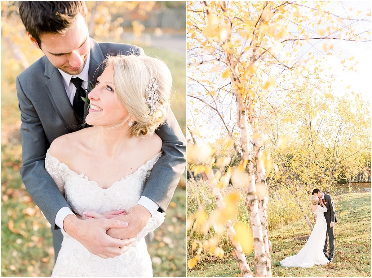 Arielle Peters Photography | Bride and groom kissing outside under trees on a fall wedding day.