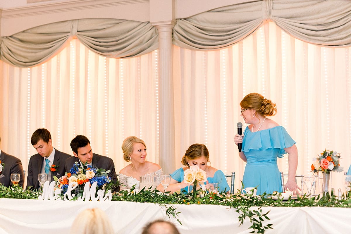 Arielle Peters Photography | Sister of the bride giving speech at fall wedding reception.