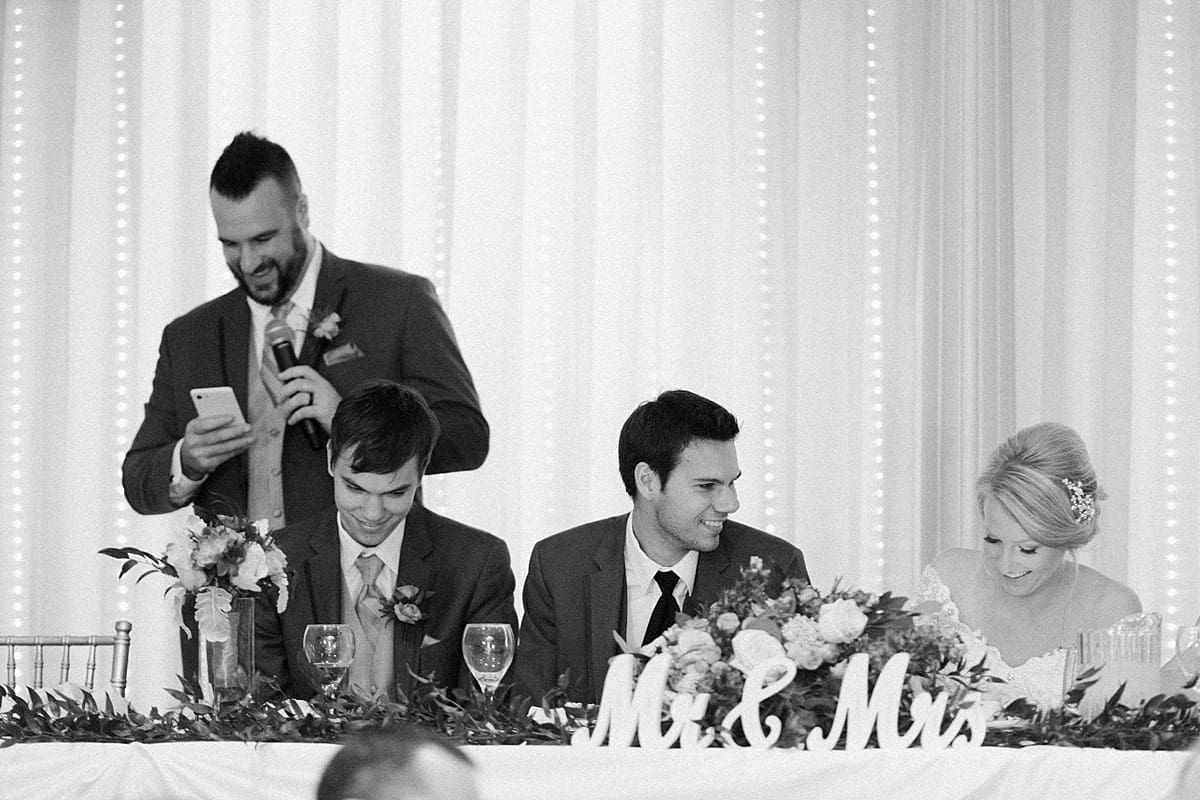 Arielle Peters Photography | Best man giving speech and laughing at fall wedding reception.