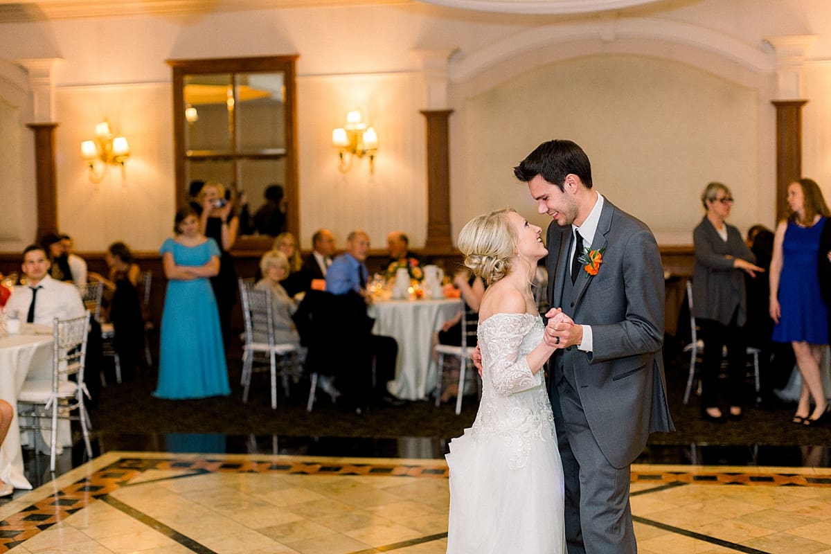 Arielle Peters Photography | Bride and groom sharing their first dance at fall wedding reception.