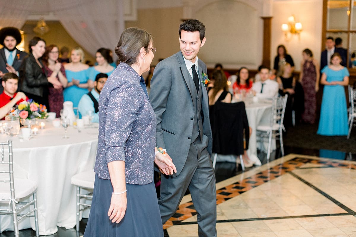 Arielle Peters Photography | Mother of the groom and the groom sharing a dance at fall wedding reception.