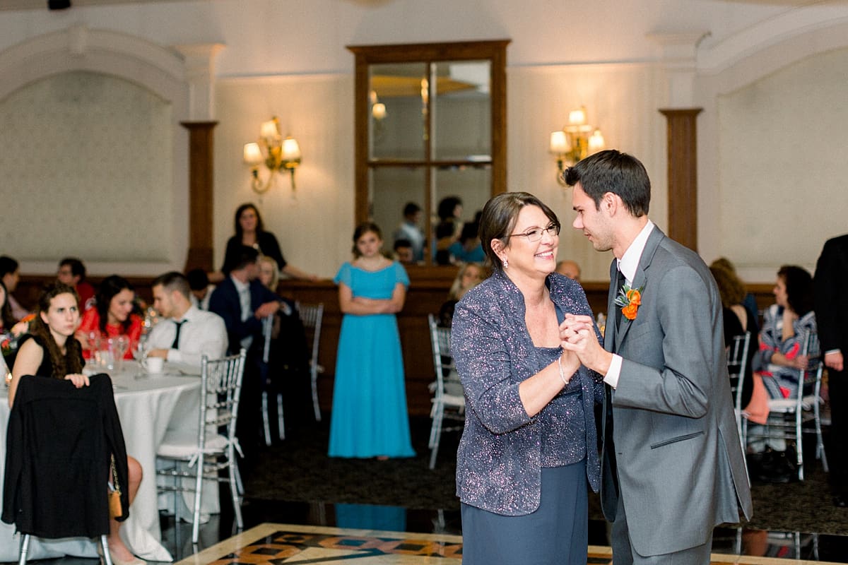Arielle Peters Photography | Mother of the groom and the groom sharing a dance at fall wedding reception.
