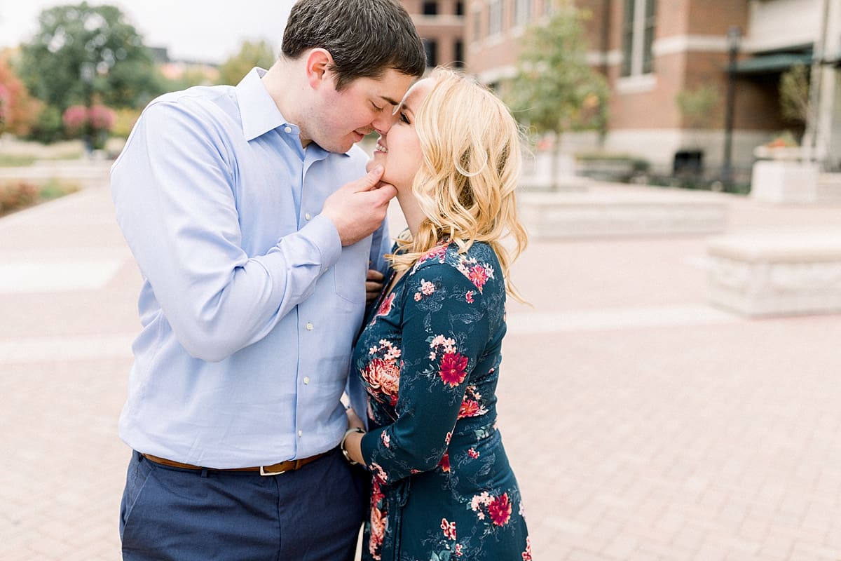 Arielle Peters Photography | Couple kissing and taking fall engagement photos at Purdue University.