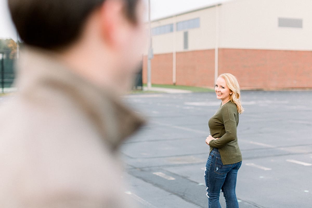 Arielle Peters Photography | Couple laughing and taking fall engagement photos at Purdue University.