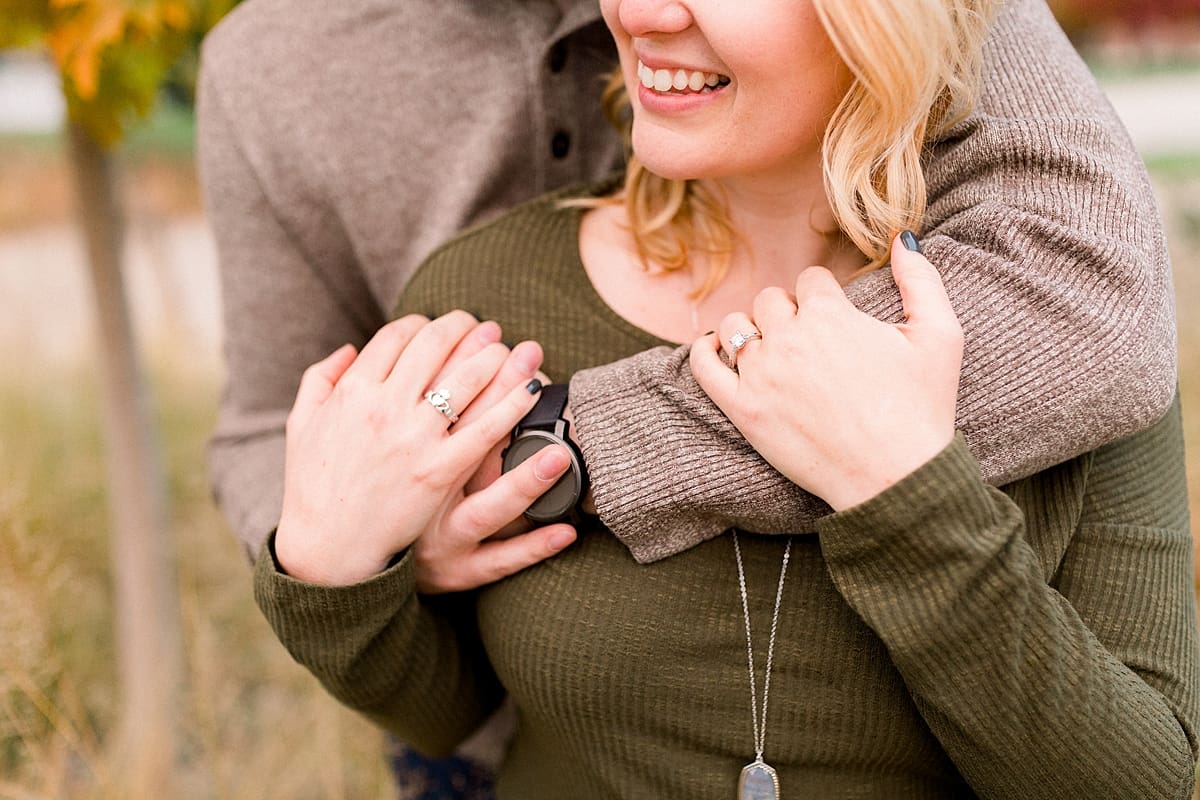 Arielle Peters Photography | Couple laughing and taking fall engagement photos at Purdue University.