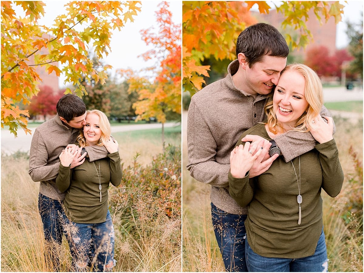 Arielle Peters Photography | Couple laughing and taking fall engagement photos in a field at Purdue University.