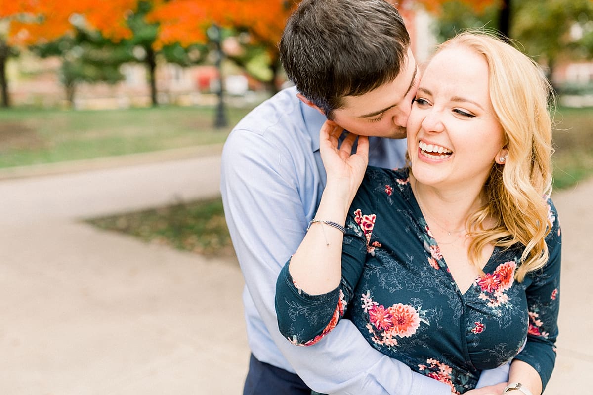 Arielle Peters Photography | Couple laughing and taking fall engagement photos at Purdue University.