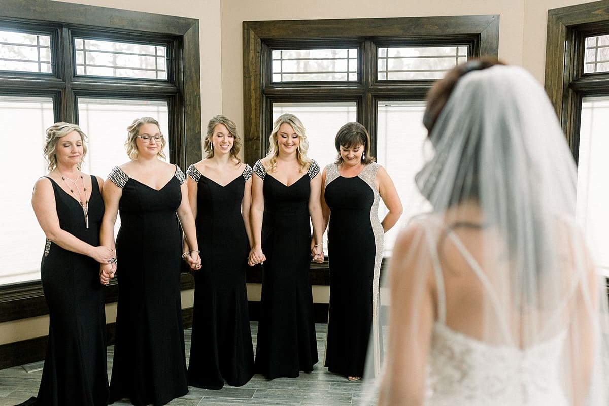 Arielle Peters Photography | Bridesmaids and mother of bride seeing the bride.
