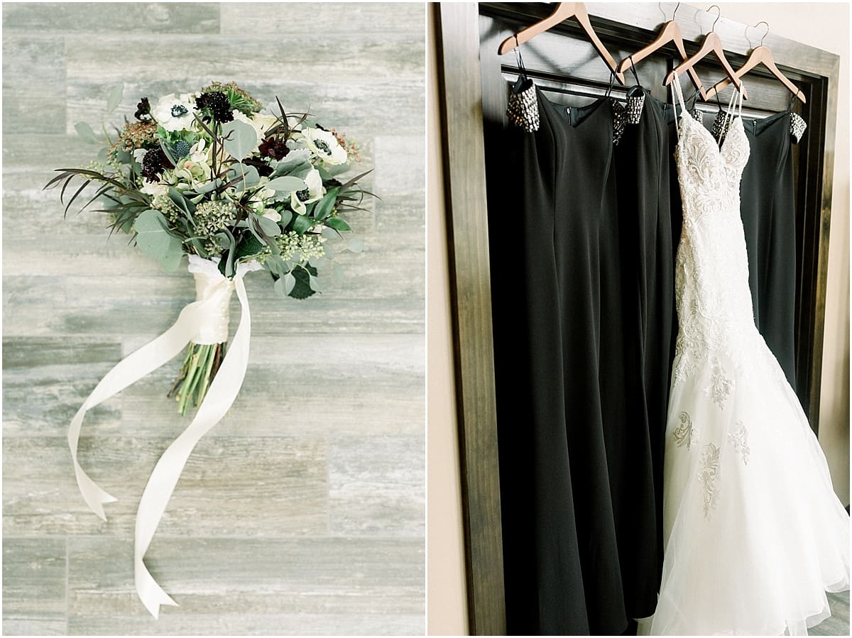 Arielle Peters Photography | Wedding gown and bridesmaids dresses hanging.
