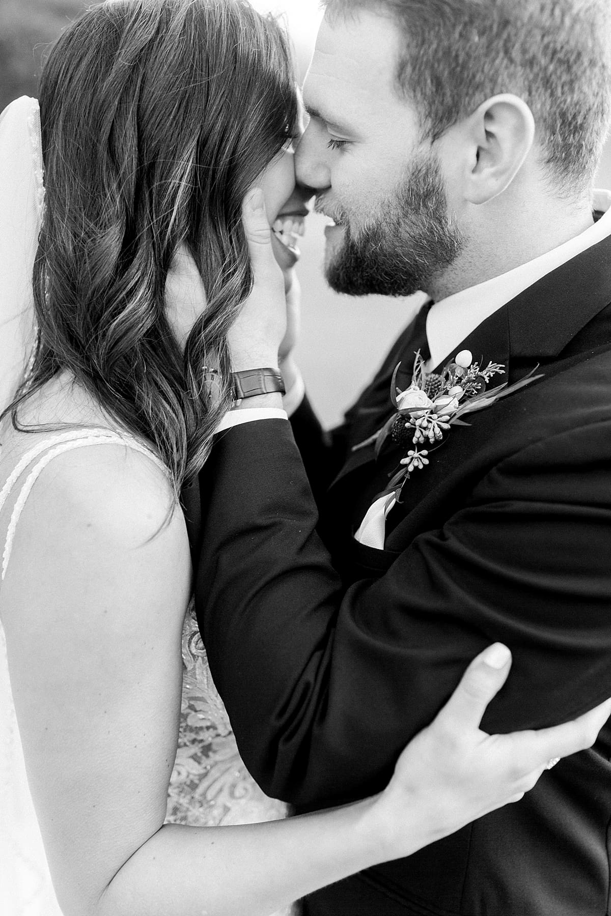 Arielle Peters Photography | Bride and Groom kissing on golf course on wedding day.