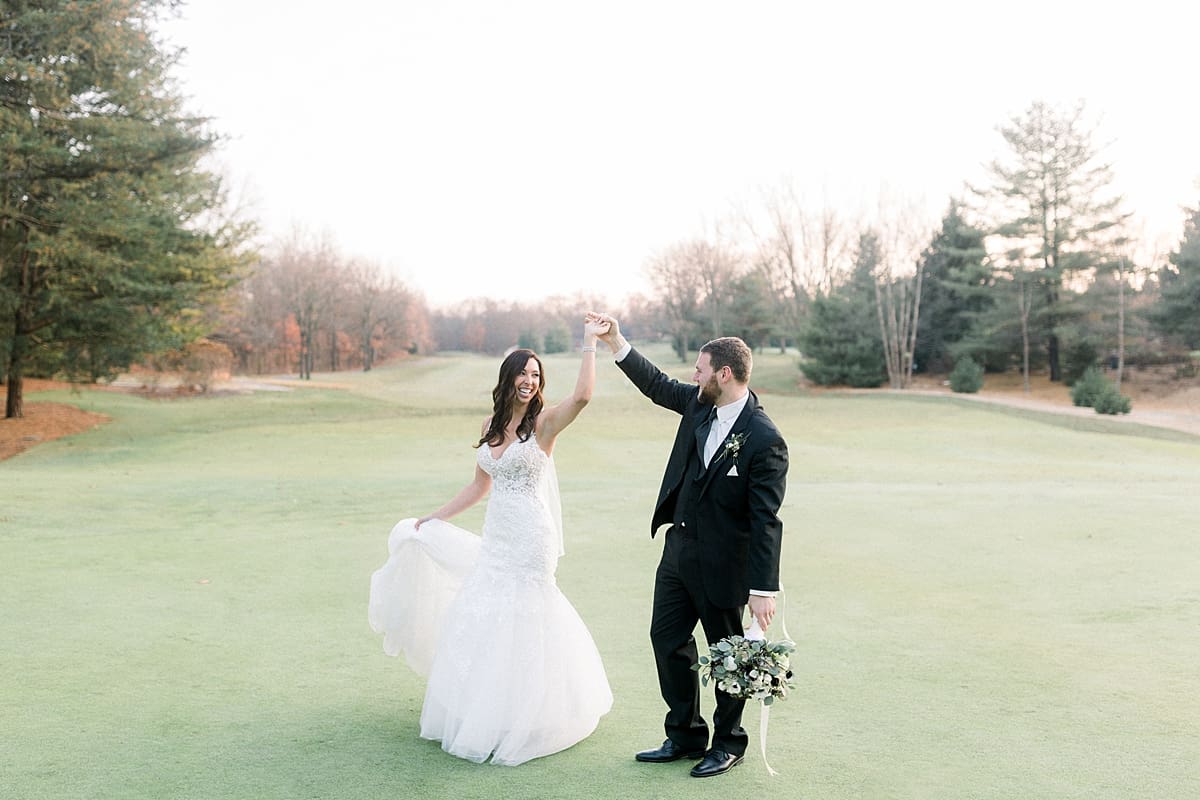 Arielle Peters Photography | Bride and Groom dancing on golf course on wedding day.