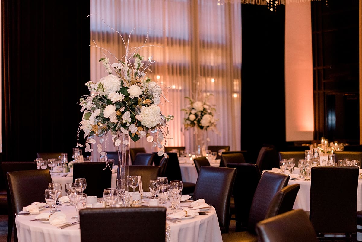 Arielle Peters Photography | Wedding centerpieces and table arrangements in reception hall.