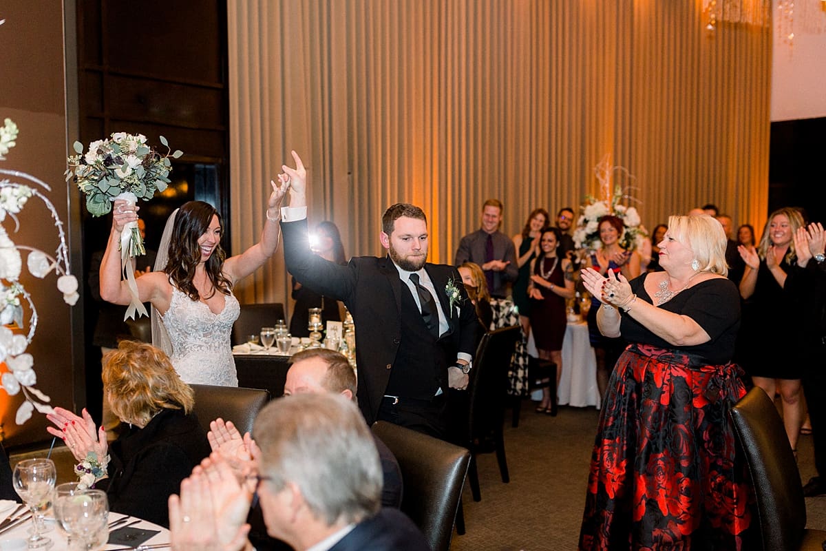 Arielle Peters Photography | Bride and Groom being announced at reception with friends and family.