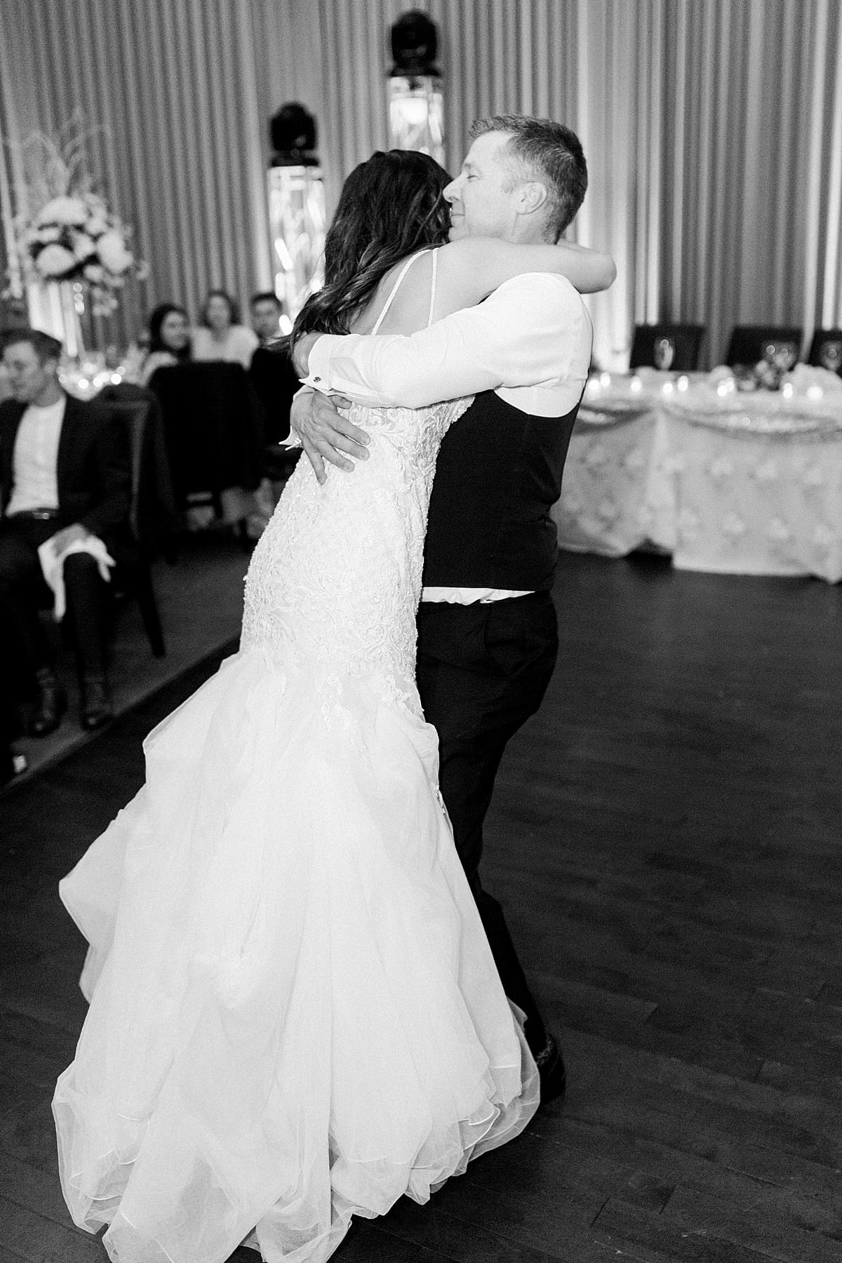 Arielle Peters Photography | Bride and father of the bride hugging on dance floor at wedding reception.