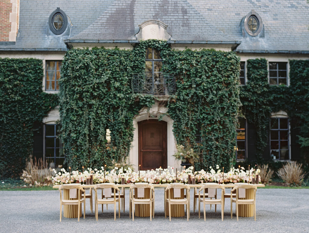 Long Greencrest Manor wedding reception tables with florals by LB Floristry, candles by Applewood Candles Co, and rentals from PR Rentals, and linens from BBJ La Tavola,