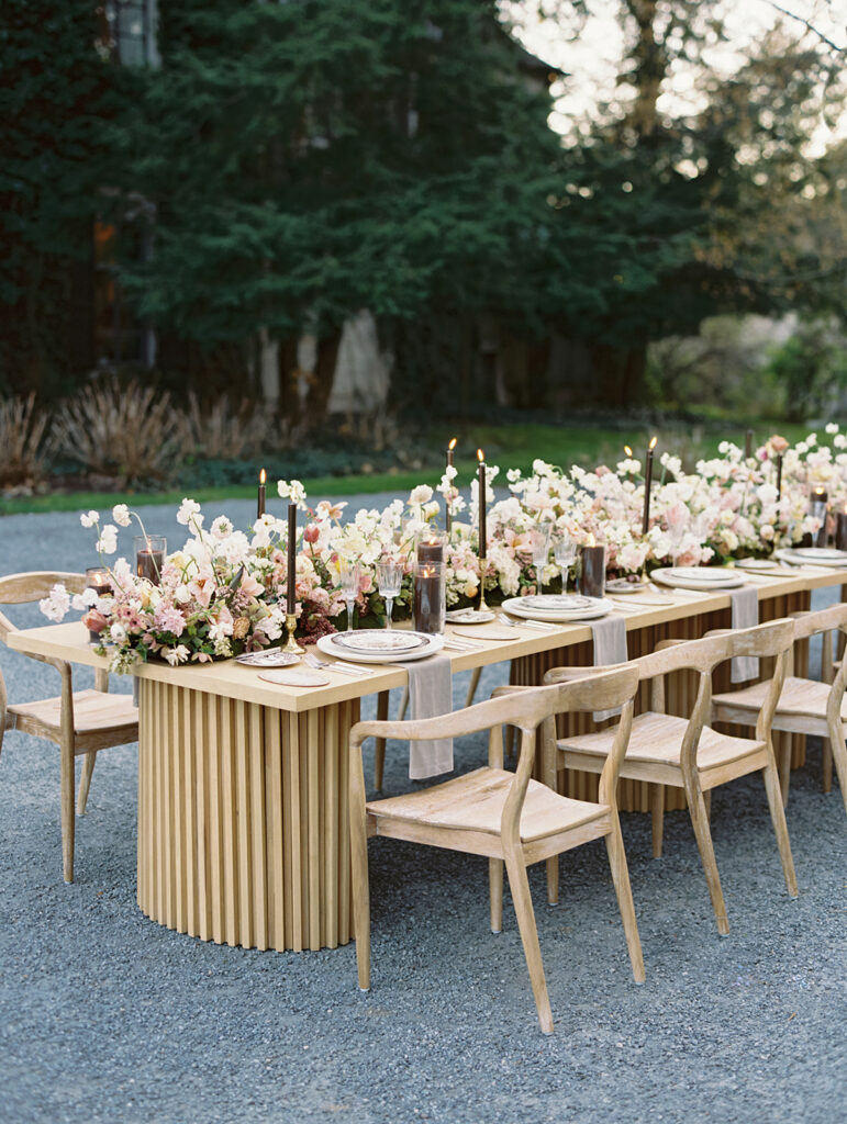 Long Greencrest Manor wedding reception tables with florals by LB Floristry, candles by Applewood Candles Co, and rentals from PR Rentals, and linens from BBJ La Tavola,