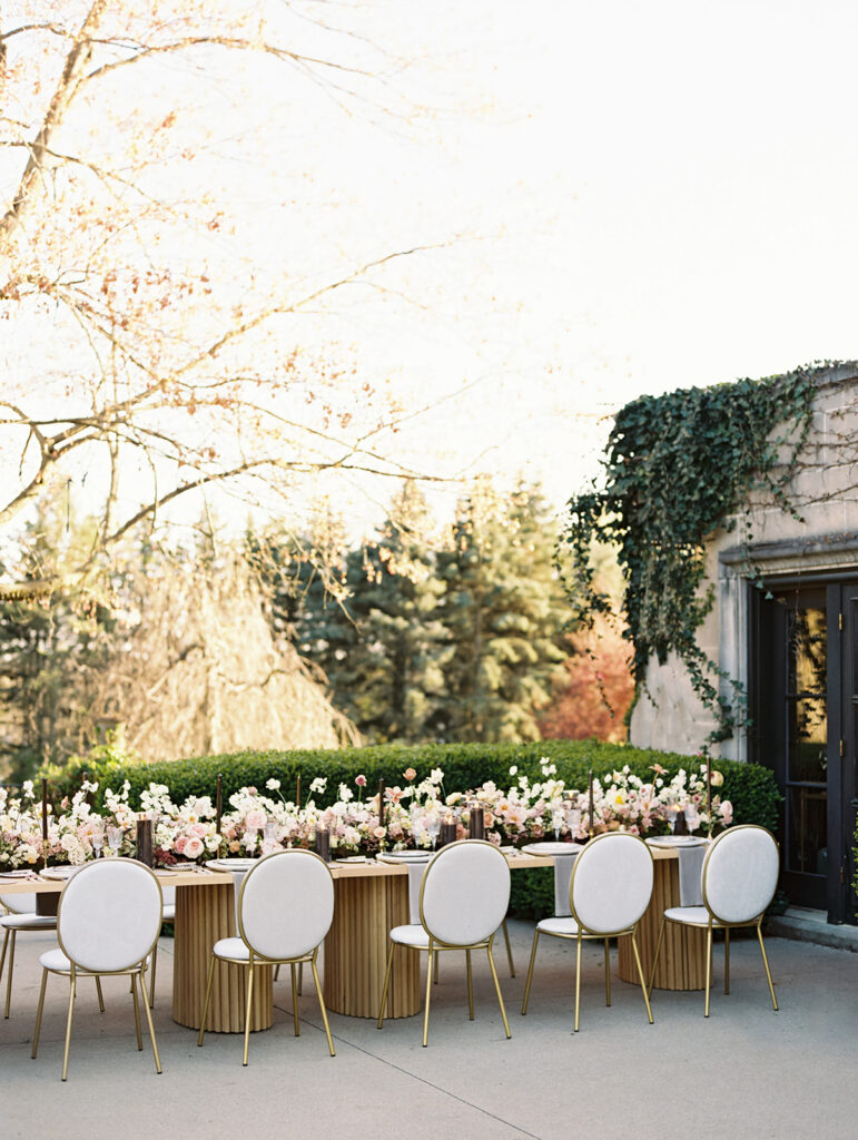 Long Greencrest Manor wedding reception tables with florals by LB Floristry, candles by Applewood Candles Co, and rentals from PR Rentals, and linens from BBJ La Tavola,