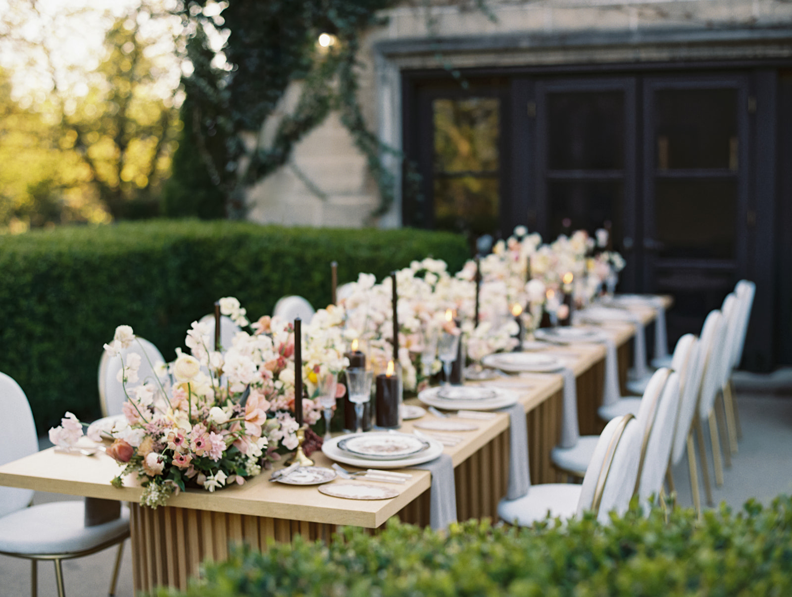 Long Greencrest Manor wedding reception tables with florals by LB Floristry, candles by Applewood Candles Co, and rentals from PR Rentals, and linens from BBJ La Tavola,