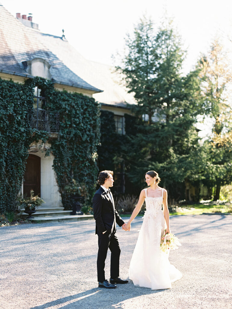 Bride and groom portraits in front of Greencrest Manor - Estate wedding venue in Battle Creek, Michigan