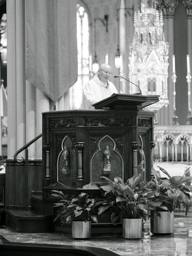 An indoor Catholic wedding ceremony at Basilica of the Sacred Heart in Indiana