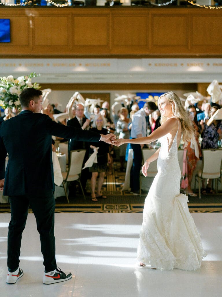 Bride and grooms entrance dance for their Notre Dame wedding reception in Dahnke Ballroom