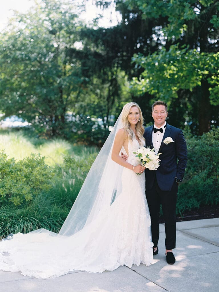 Outdoor bride and grooms portraits at University of Notre Dame in Indiana captured on film.