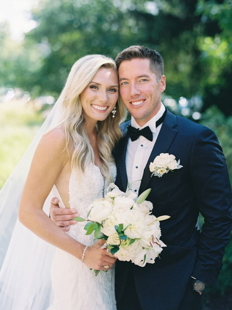 Outdoor bride and grooms portraits at University of Notre Dame in Indiana captured on film.