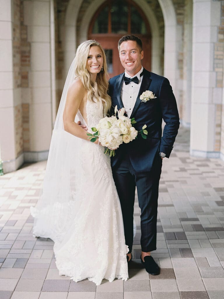 Outdoor bride and grooms portraits at University of Notre Dame in Indiana captured on film.