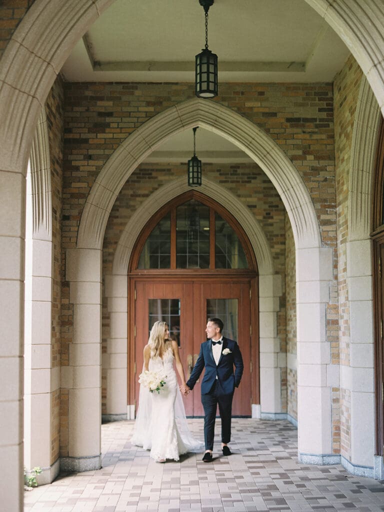 Outdoor bride and grooms portraits at University of Notre Dame in Indiana captured on film.