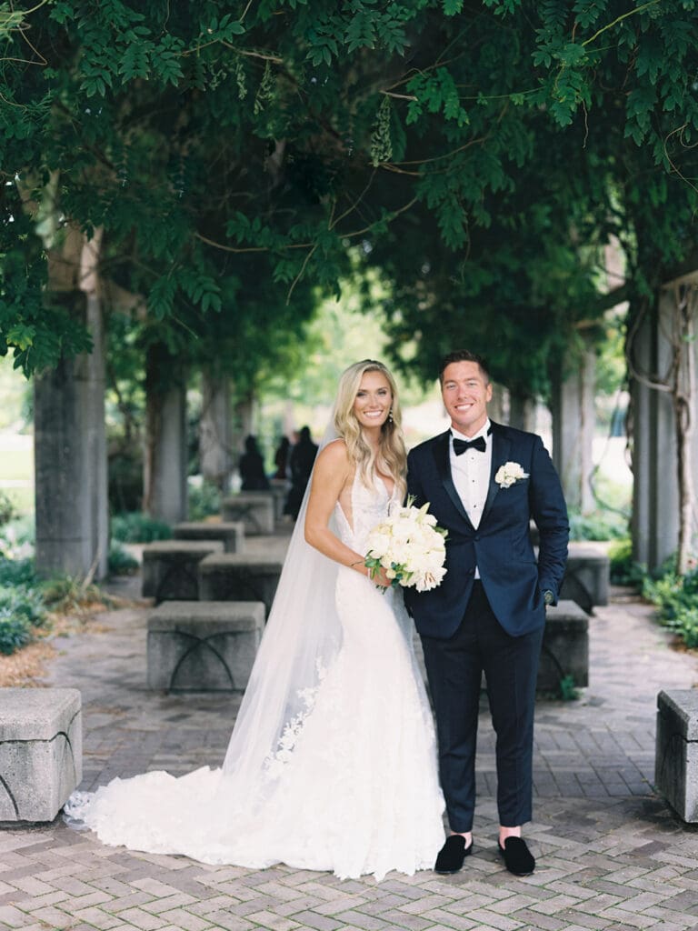 Outdoor bride and grooms portraits at University of Notre Dame in Indiana captured on film.