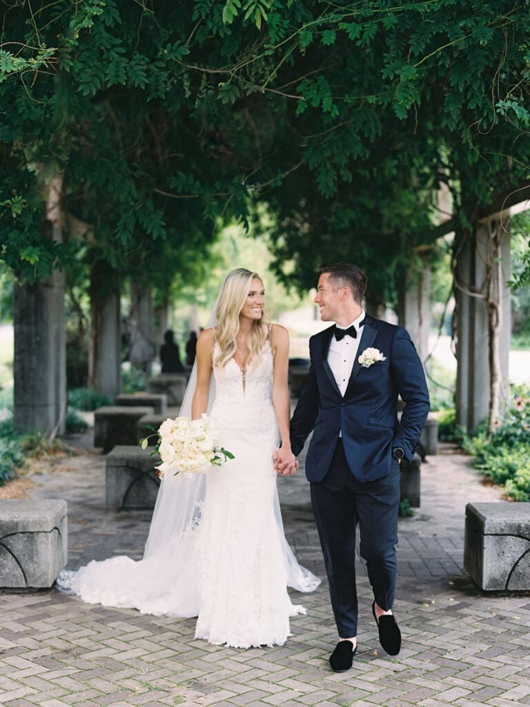 Bride and grooms outdoor wedding portraits at University of Notre Dame in Indiana captured on film