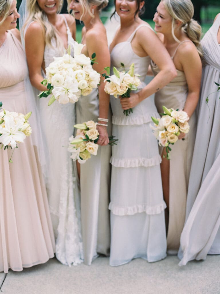 Bride and bridesmaids portraits from am elegant summer Notre Dame wedding in Indiana