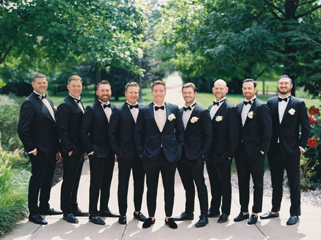 Groom and groomsmen portraits from an elegant summer Notre Dame wedding in Indiana
