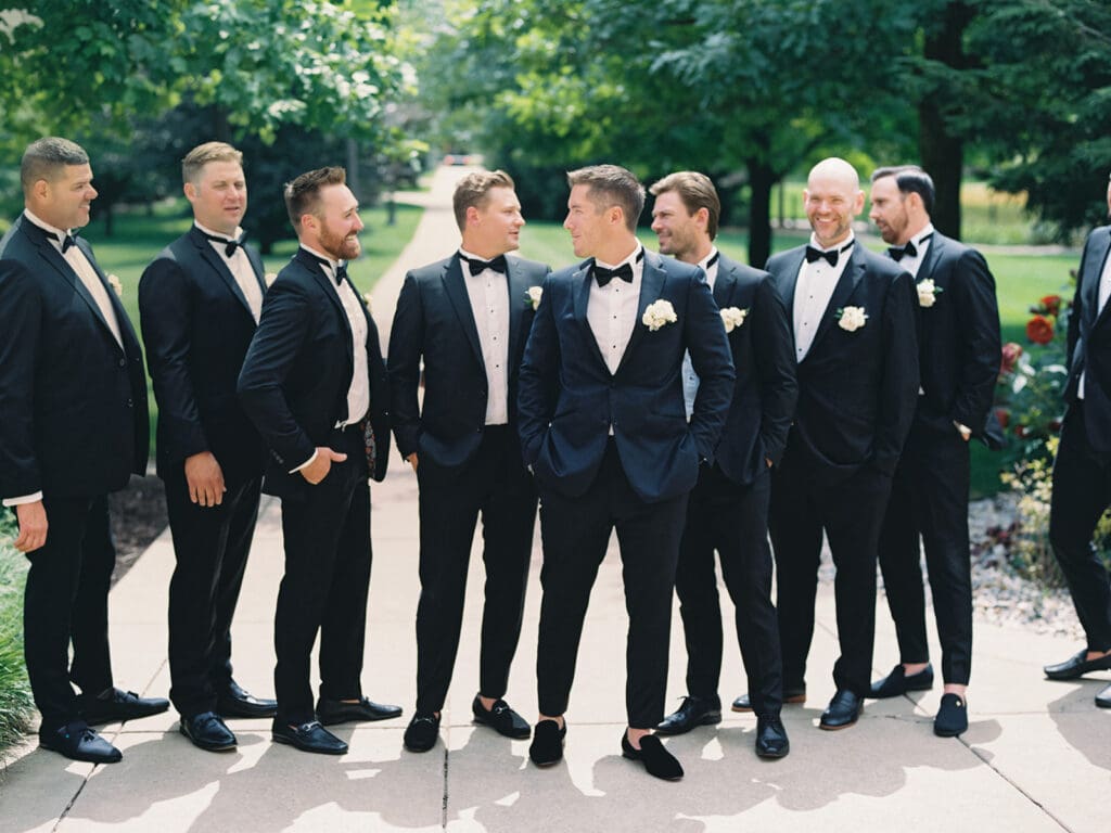 Groom and groomsmen portraits from an elegant summer Notre Dame wedding in Indiana